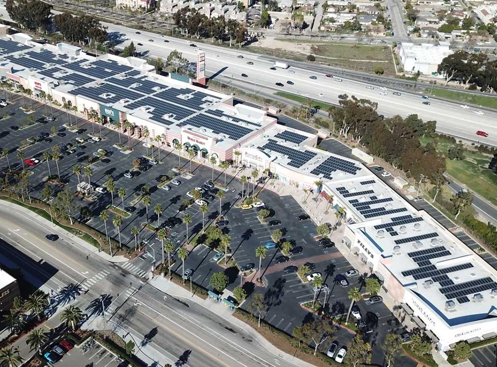 Commercial retail and shopping center with rooftop solar and roof pv.