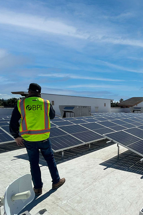 Rooftop Solar Commercial PV BPi Construction Solar Installer Overlooking Solar Panels